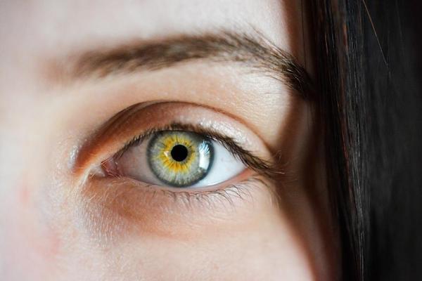 Female with green eye