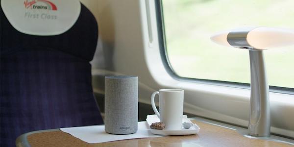 train seat and table with mugs and Alexa on it